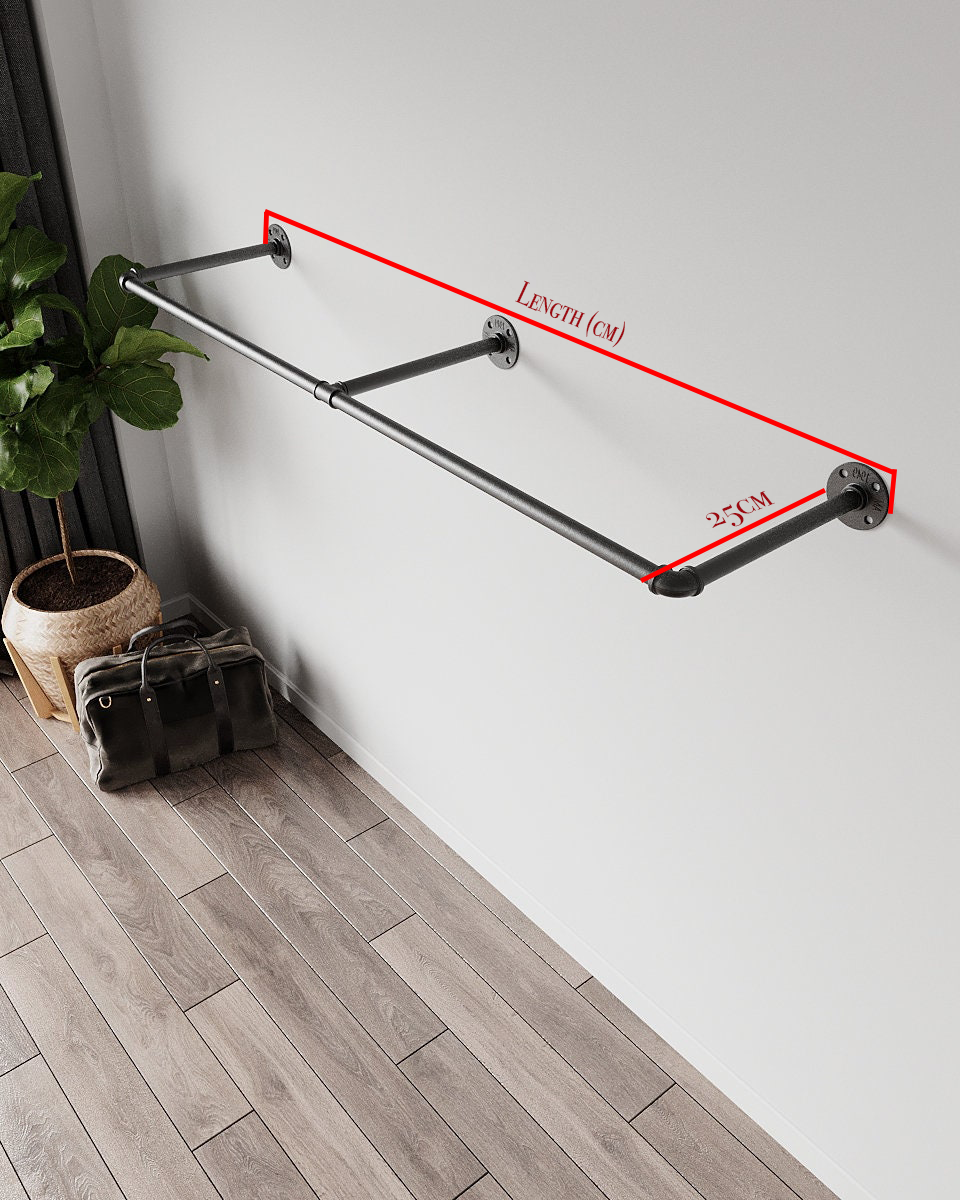 Caela Clothes Rail, a versatile clothing rail wall mounted, suitable for shop clothes display stands, storage clothing, and clothing hanging rail in various spaces.