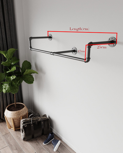 Wall-Mounted Clothes Rail with hanging garments
