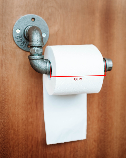 Toilet Roll Holder mounted on the wall, showcasing its sleek and practical design.