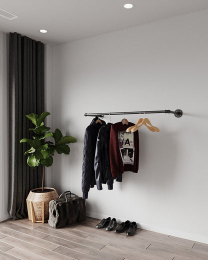 Industrial Pipe Wall Mounted Clothing Rack, a sleek and durable clothes rail and open wardrobe solution, suitable for various aesthetic settings.